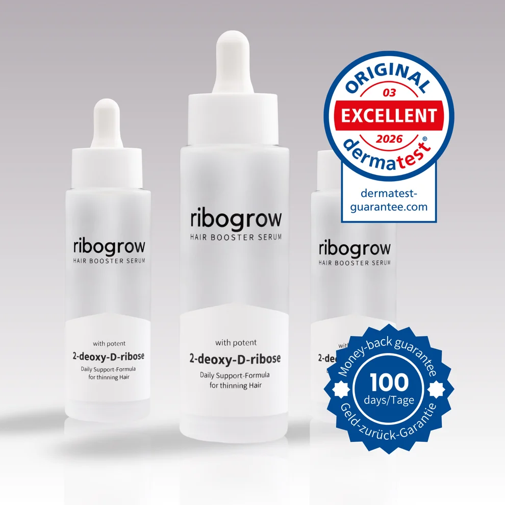 Drei Flaschen ribogrow Hair Booster Serum mit Pipette und Dermatest-Siegel